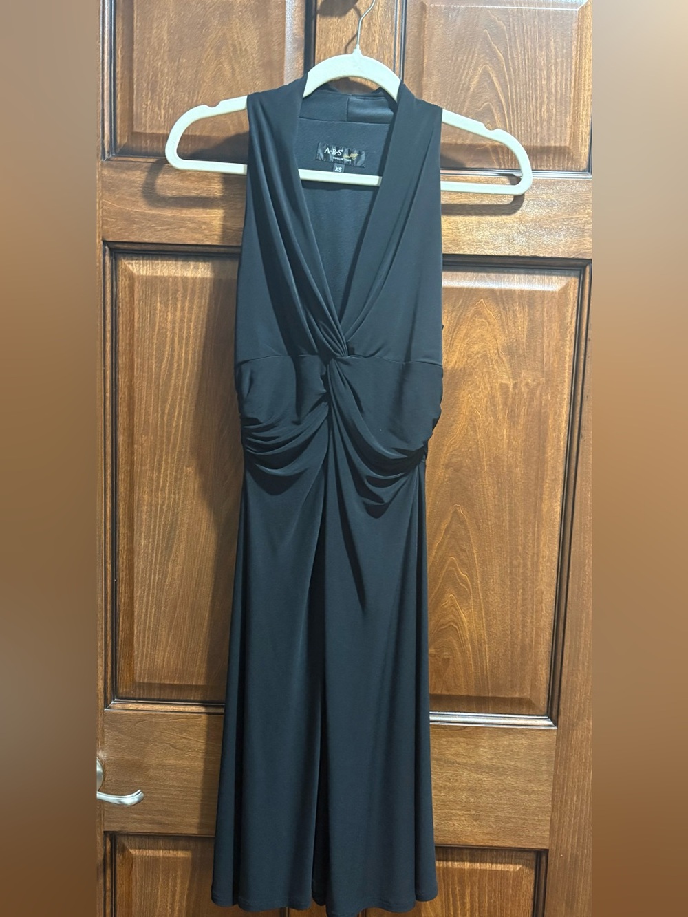 ABS Black Sleeveless V-Neck Knot Front Dress. XSmall.